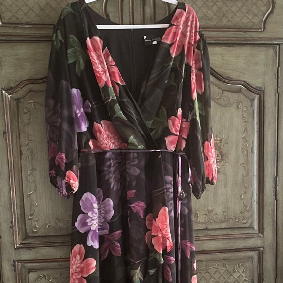 Maison Tara Dresses & Skirts - Stunning… Black Midnight Floral Maison Tara faux wrap dress with sheer sleeve